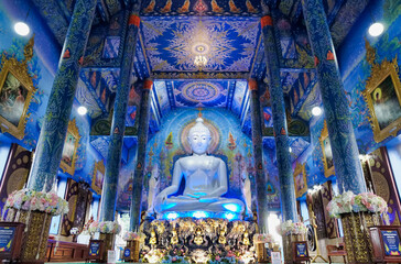 The white principal chapel in Rong Suae Ten temple at Chiang Rai province. Beautiful blue temple in Thailand.