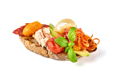 Bruschetta with various toppings, isolated on white background. High resolution image.