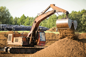 Special equipment for collecting peat. Peat extraction process. Agriculture industry, peat farm