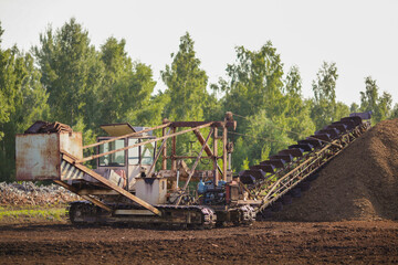 Fototapeta premium Special machine for peat extraction, raised bog