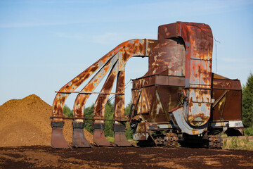 Special equipment for collecting peat. Peat extraction process. Agriculture industry, peat farm