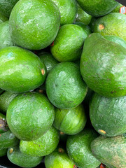 avocados on the shelves at the store