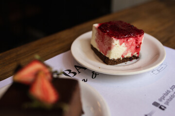 chocolate cake with strawberries and cheescake