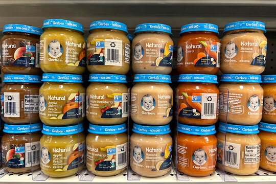 Alameda, CA - Feb 14, 2022: Grocery store shelf with Gerber brand 2nd stage baby foods in various flavors. A formerly American-owned company, Gerber is now a subsidiary of Nestle Group.