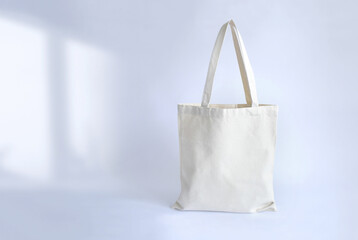 Canvas tote bag. Mockup.Reusable grocery shopping bag with copy space.Beige eco bag mockup.Eco...