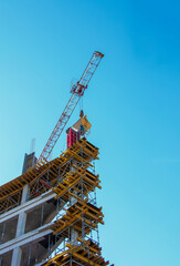 Construction formwork, reinforcement for the construction of buildings. Workers make a concrete structure