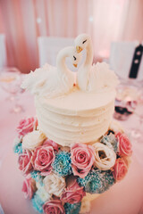 Beautiful wedding cake on the table at the wedding reception