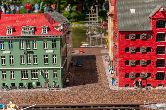 Billund, Denmark - June 25 2011: Lego Model Ogf A Green House And A Red Warehouse.