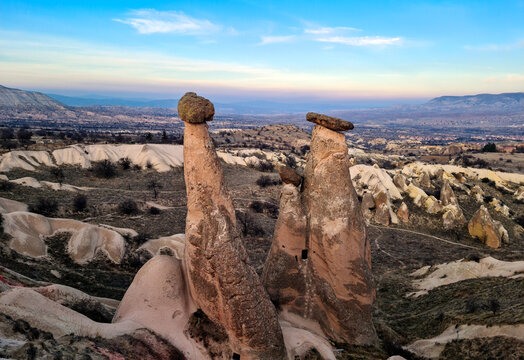 Three Graces in Cappadocia, Nevsehir, Turkey. Fairy chimneys. Turkish name is "&Uuml;&ccedil; G&uuml;zeller".  Selectively focused on Three Graces.