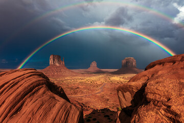 Monument Valley Arizona double rainbow and desert landscape