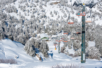 Empty ski lifts on a snowy mountain in winter. Troodos ski resort Cyprus Europe