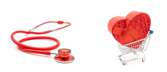 red stethoscope with Red big heart-shaped gift with bow for Valentine's Day in shopping cart on isolated white background