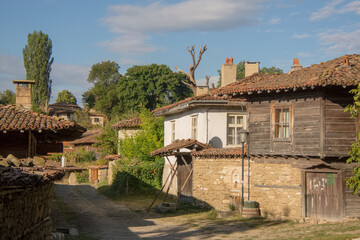 Fototapeta na wymiar Street in the village of Zheravna on a sunny morning, Bulgaria
