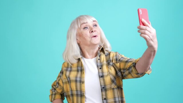 Grandma blogging trip make selfie device isolated cyan color background