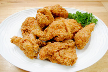 Fried Chicken Pieces on a White Platter