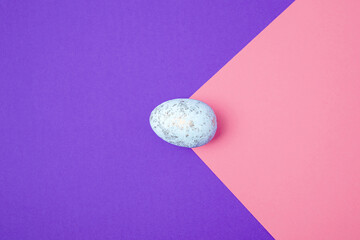 Easter eggs on a colored background. Festive banner with copy space.