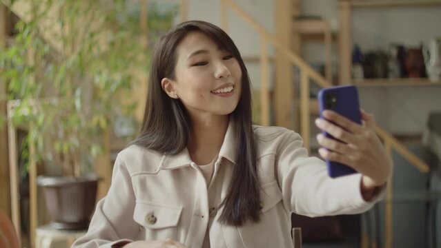 A handsome lady is taking some photos 