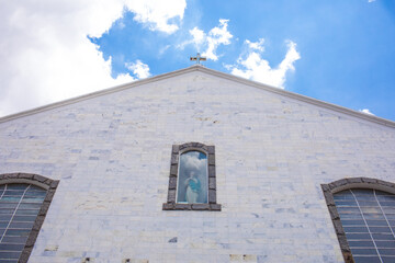 Fototapeta na wymiar Partial view of the Church of Saint Curé D'Ars