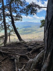 Top of hill. Amazing cliff photo. Beautiful landscape and view. Green mountains and nature forests