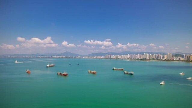 sanya city bay sunny day famous hotel resort rooftop panorama timelapse 4k hainan island china