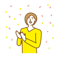 拍手をして喜びを表現する若い女性