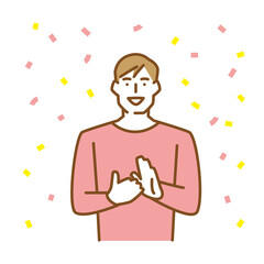 拍手をして喜びを表現する若い男性