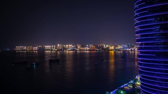 night illuminated sanya bay famous hotel complex side rooftop panorama timelapse 4k hainan island china