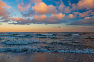Sunrise Baltic Sea Mielno with colorful storm clouds