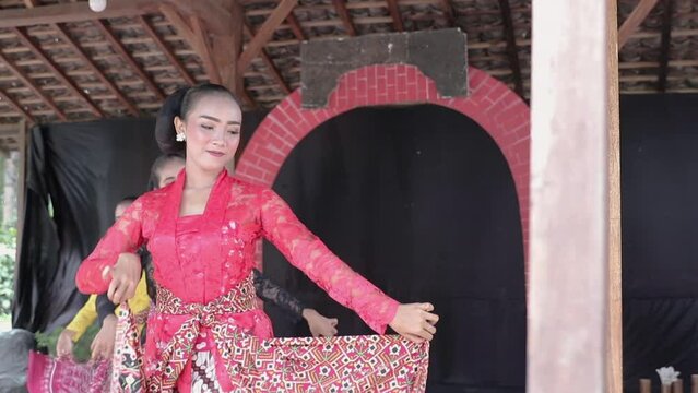 portrait of a traditional javanese dancers practicing