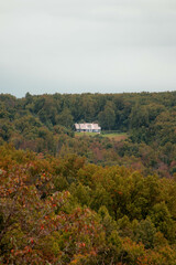 Fototapeta na wymiar Cloudy View of Fall Forests