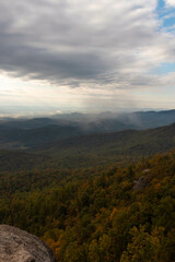 Sun Rays Shining Through the Clouds on a Overcast Fall Day in Virginia Old Rag Mountain