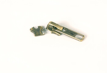 Broken Zipper Slider in Antiqued Brass or Bronze Color with Pull Isolated on White