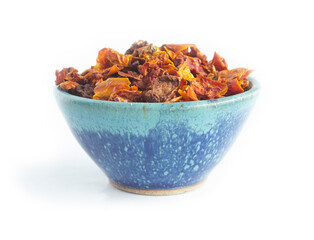 Dehydrated Tomato Chunks in Cheery Red and Orange Colors in Blue Pottery Bowl 