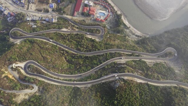 BP Highway viewed from above, looking down at the traffic driving on the Banepa Bardibas Highway in Nepal.