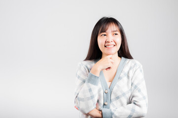 Happy woman hand touch chin handle relaxed thinking about something about the question, Portrait Asian beautiful young female idea think studio shot isolated on white background with copy space