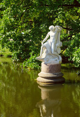 Garden Of The Chinese Palace. Antique statue of Jonah in the waters of a pond