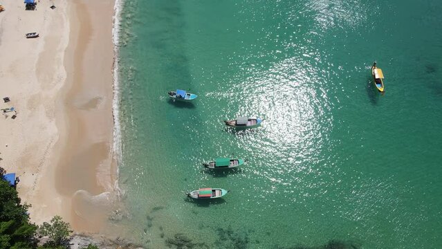 Aerial view Top-down beach sea and wood boat on sea water