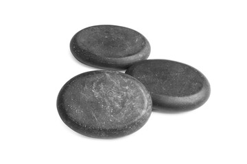 Group of black stones on white background