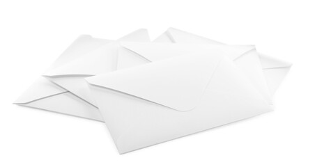 Heap of paper envelopes on white background