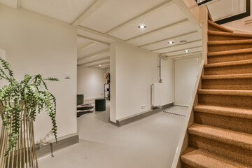 Large staircase in the basement with fresh flowers