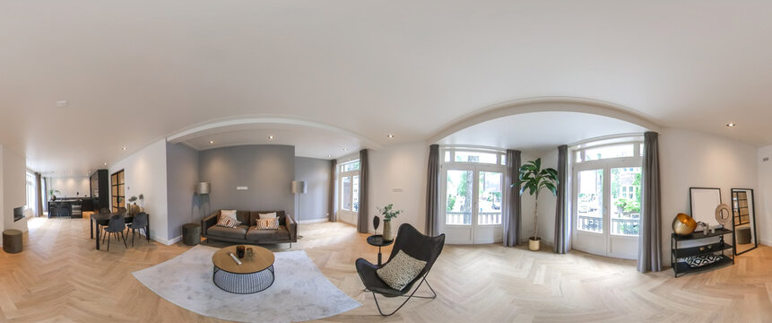 living room interior with large sofa and two floor lamps