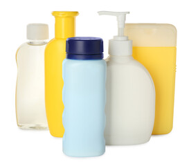 Bottles of baby cosmetic products on white background