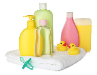Obraz na płótnie Canvas Bottles of baby cosmetic products, towel, pacifier and rubber ducks on white background