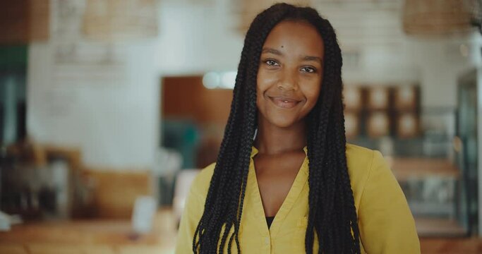 Portrait of confident and successful young black woman