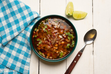 Beef birria consomme with chickpeas. Mexican food