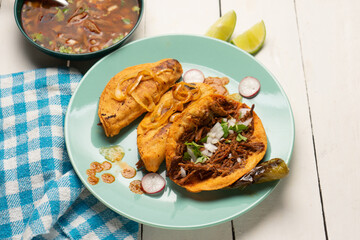 Beef birria tacos with sauce. Mexican food
