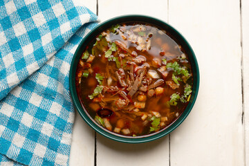 Beef birria consomme with chickpeas. Mexican food
