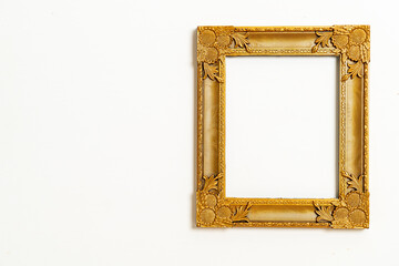 empty picture frame on white wall background