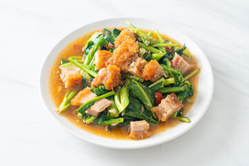 Stir-fried kale vegetable with crispy pork