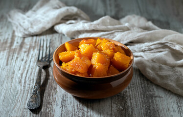 Pumpkin baked in pieces. Useful dessert.